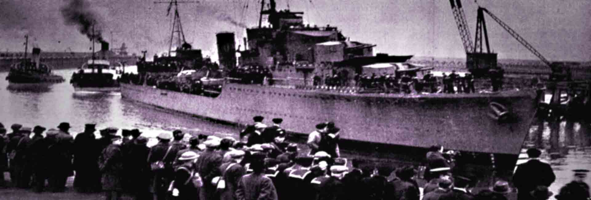 HMS Cossack arrives in Leith, greeted by onlookers